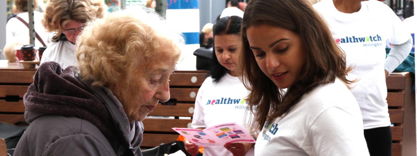 Healthwatch Hillingdon Volunteer with a member of the public