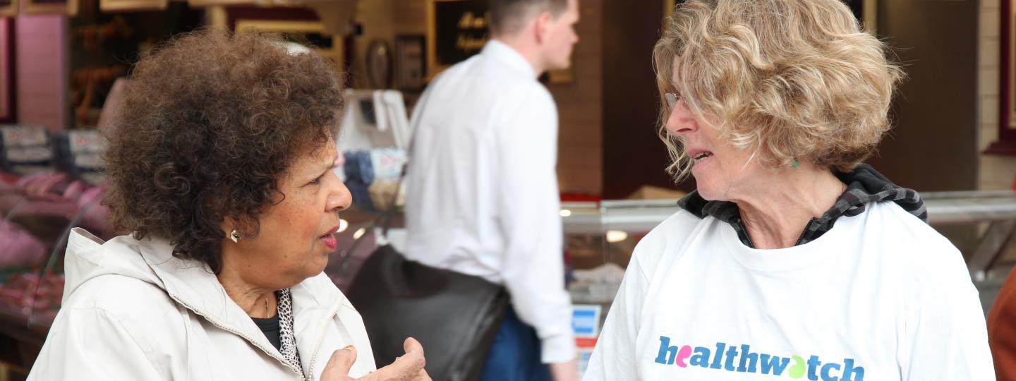 Healthwatch Volunteer with a member of the public